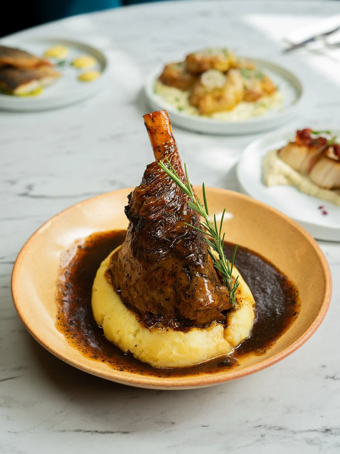 Lamb shank with mash and rosemary